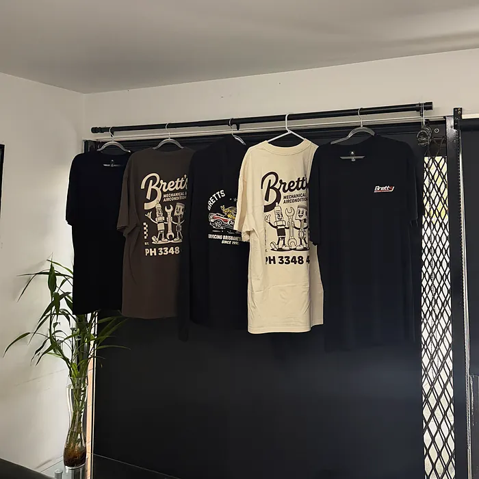 Brett’s Mechanical t-shirts on a rack