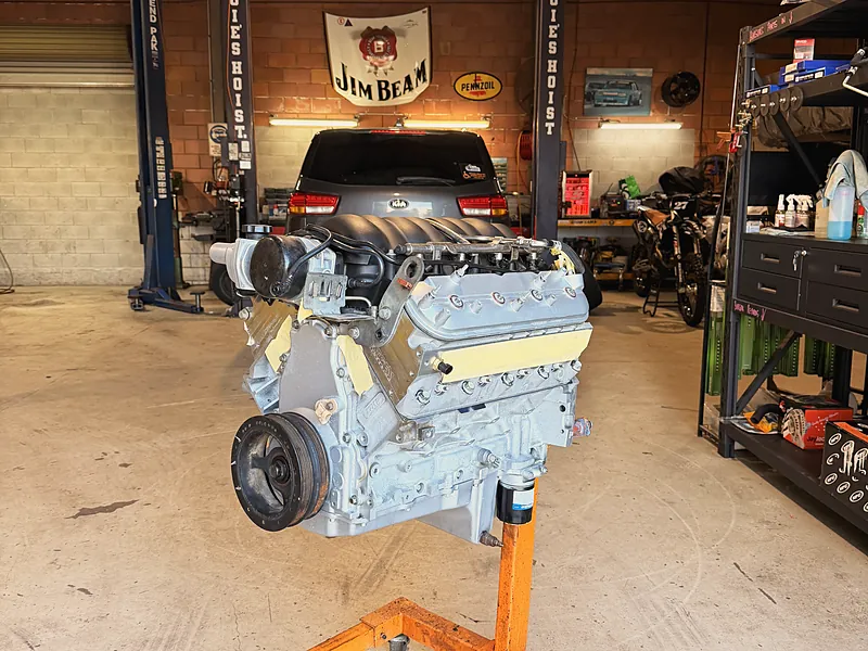 A freshly built LS V8 on an engine stand in the workshop